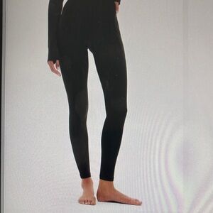 Athleta Black Salutation Stash Tight Leggings